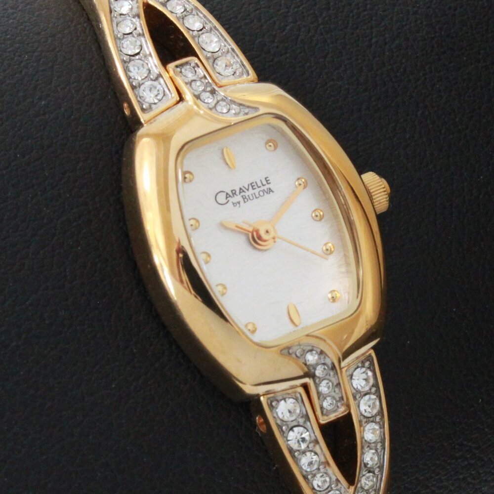 Caravelle Ladies Gold Tone Quartz Watch, MOP Dial, ½ Bangle Bracelet  16mm